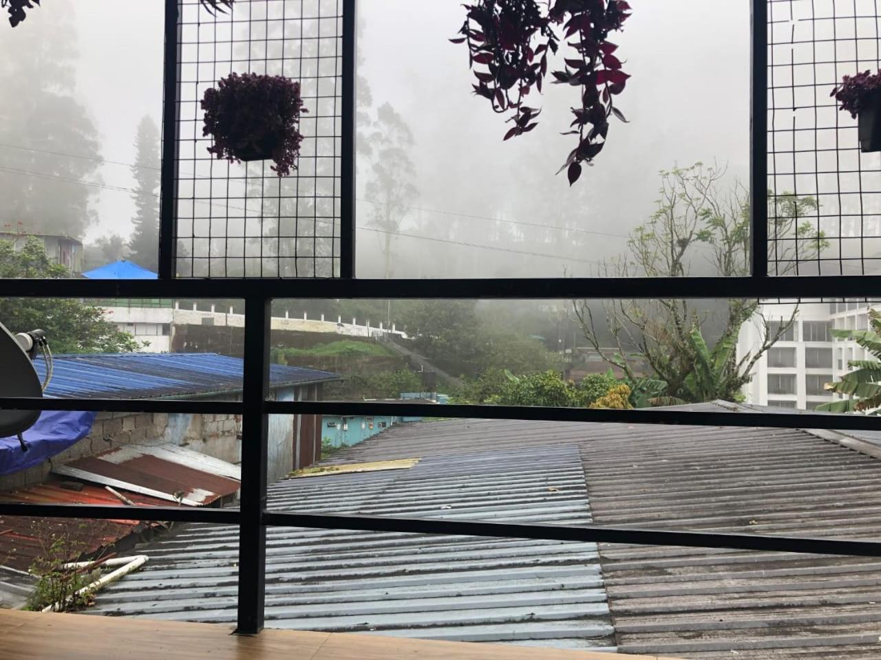 Birdwing Cottage, Munnar Buitenkant foto